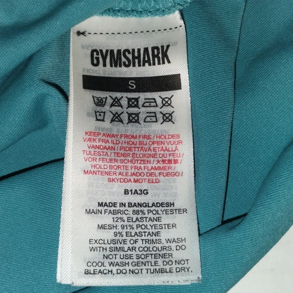 Gymshark Long Sleeve Crop Top. Teal in color. Women's size Small. - Picture 9 of 10